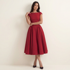 Elegante midi jurk met volumineuze rok – Maud